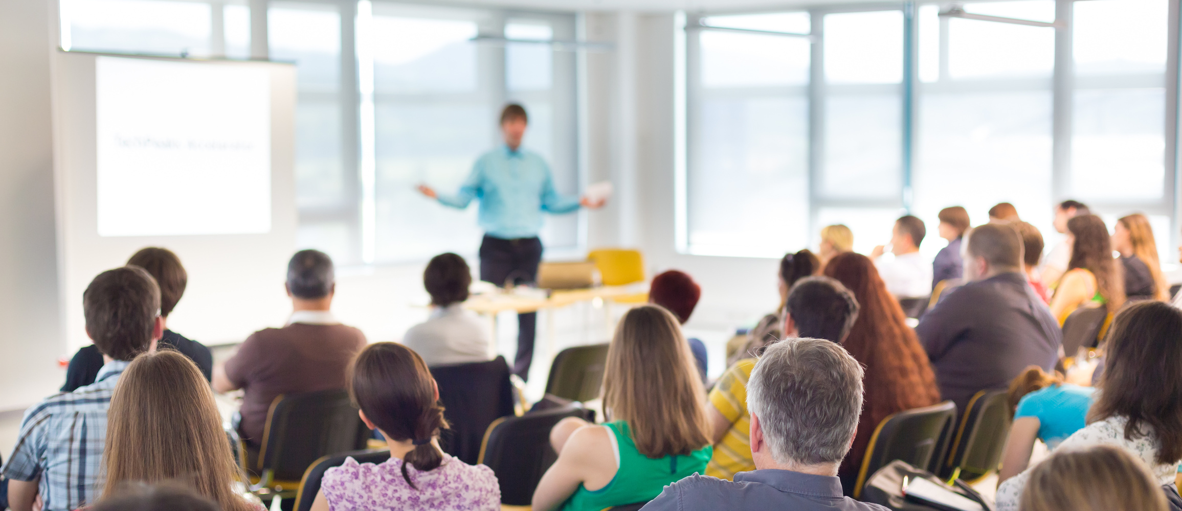 Speaker Giving a Talk at Business Meeting